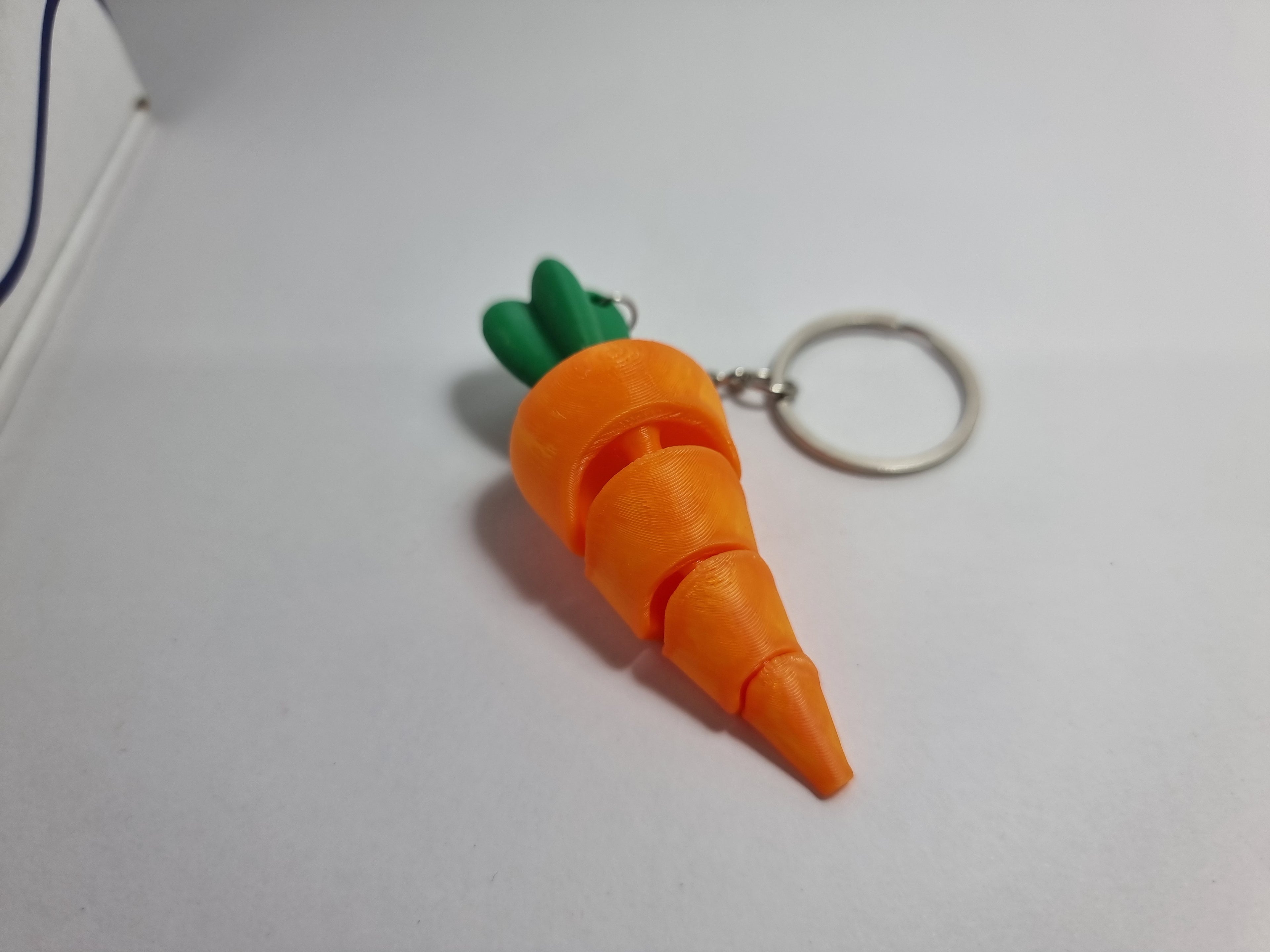 Flexi Carrot Keychain in everyday use, 20260430 021832