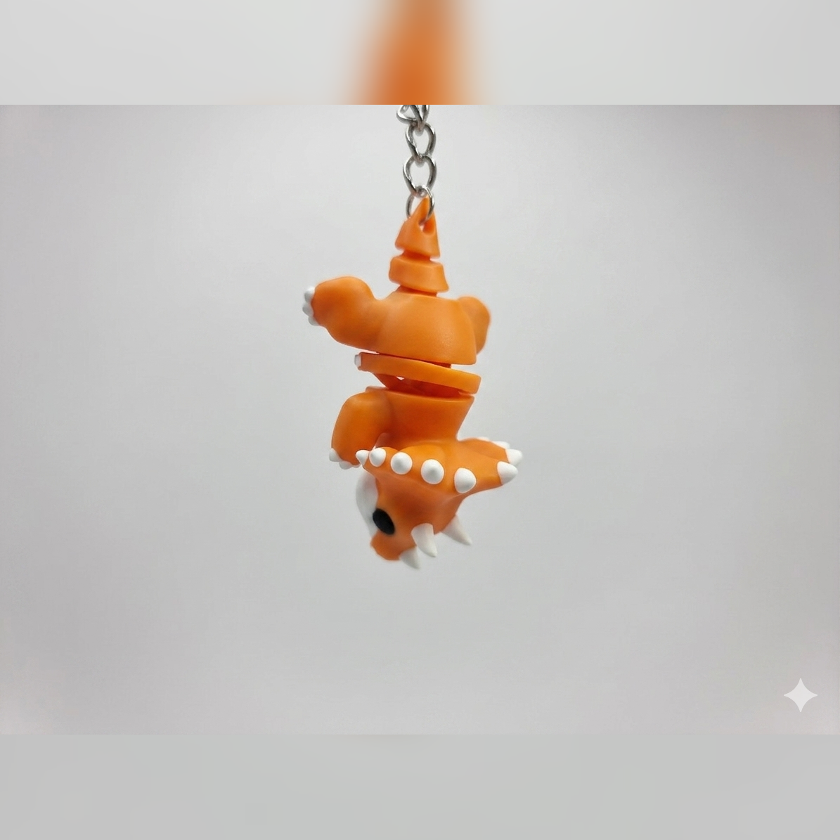Flexi Triceratops Keychain